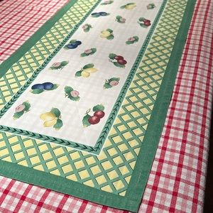 62 inch long by 13 inches wide Tablerunner with fruit and flowers and green